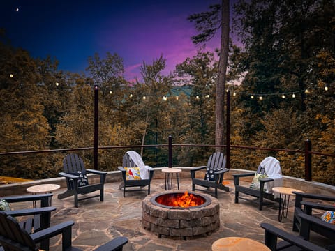 Your outdoor Oasis...flagstone fire pit w/ Adirondack chairs under the Smoky sky