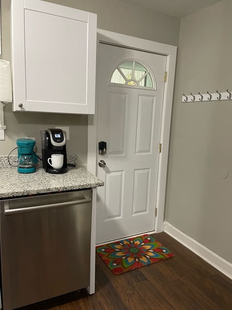 Kitchen exit to backyard and the BBQ Grill