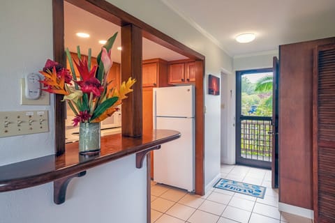 welcome to Hanalei Colony Resort C2 - You'll be able to whip something up with ease in the fully stocked kitchen! There's also a selection of beach gear in the storage closet, including beach chairs and towels.