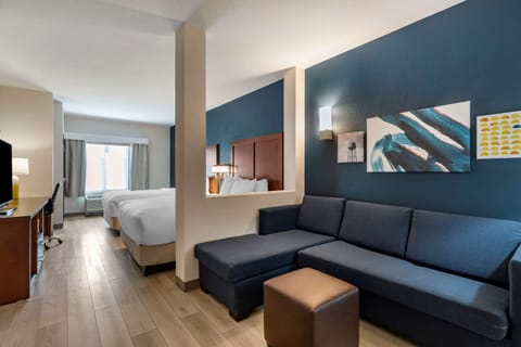Suite, 2 Queen Beds, Non Smoking | Desk, laptop workspace, blackout drapes, iron/ironing board
