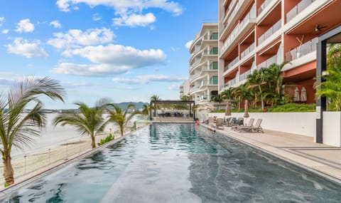 Pool & Grill Area with Beach Access