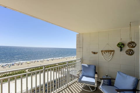 Oceanfront balcony with panoramic Atlantic views from your private coastal retreat. Direct beach access, relaxing lounge seating, and sunrise vistas.