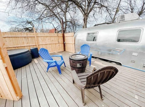 Enjoy the private deck with hot tub, fire pit and grill. 