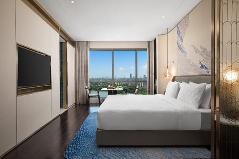 Premium bedding, down comforters, pillowtop beds, minibar