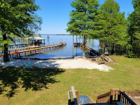 Lake front with beach, dock is one to the right
