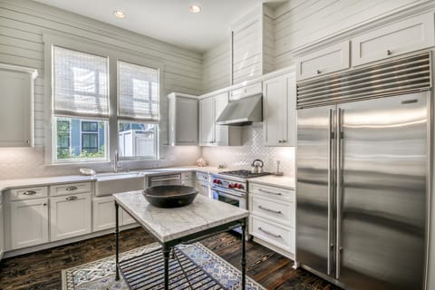 Gourmet Kitchen with Stainless Steel Appliances Including Viking, Wolf, and More