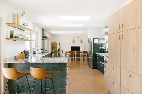 Gather around the island for breakfast with mountain views.