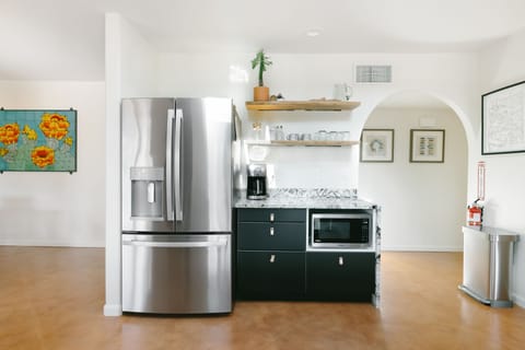 Modern appliances and sleek design make cooking a joy here.