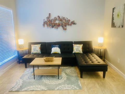 Spacious living room with comfortable seating.