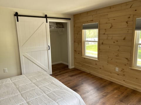 Master bedroom closet with barn door