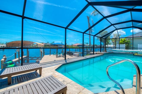 Million Dollar View... View to canal, over pool, facing due south. 