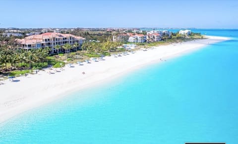 ENDLESS MILES OF WHITE SAND BEACH IN PROVIDENCIALES - VILLA RENAISSANCE PH 301-2