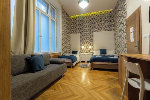 Basic Quadruple Room | In-room safe, blackout drapes, soundproofing, iron/ironing board