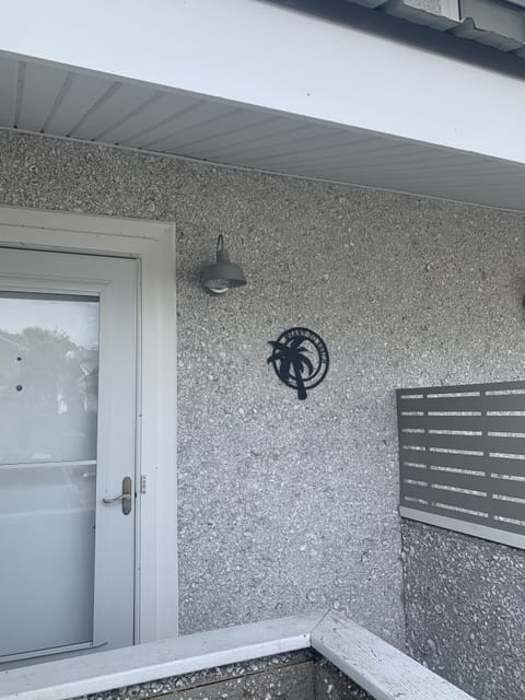 Welcome to meant to beach, front porch with a private outdoor shower.