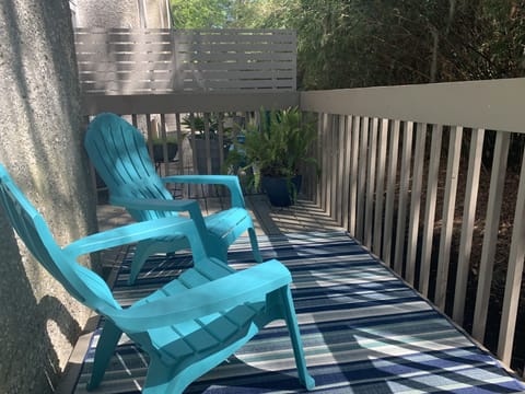 Peaceful back deck overlooking bamboo and a quiet golf course.
