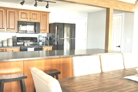 Keurig & starter supply of cups, Fridge with ice maker and filtered water inside