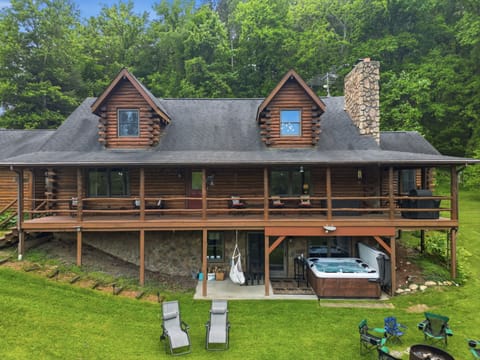 Plenty of places to relax and connect w/hot tub, deck, fire pit & fishing dock.