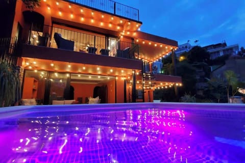 Evening view of the Villa. Top left is Ivan's Bella Vista, private entrance and terrace. Below is Curiel's retreat(2BR) with private poolside terrace. Top right is Miguel's Mirador(1BR) and below Jonathan's Lugar (1BR).