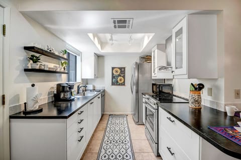 Remodeled Kitchen - New Cabinets and Counters, and Stainless Appliances