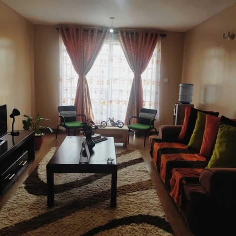 Comfort Apartment | Living area | 14-inch Smart TV with digital channels, TV