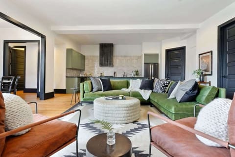 Unit 3: Living Room | XL Flat Screen TV | Single-Level Layout | Central Common Area