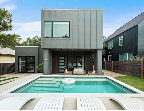Unwind in a serene private yard with a refreshing dipping pool, fully fenced for your comfort and seclusion. The perfect escape for a tranquil retreat.