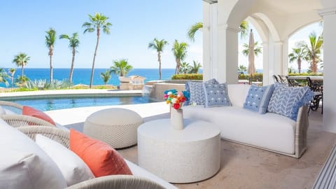 Villas Del Mar 212 - Poolside seating area with ocean view