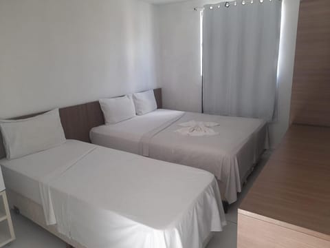 Basic Triple Room | Blackout drapes, free WiFi, bed sheets