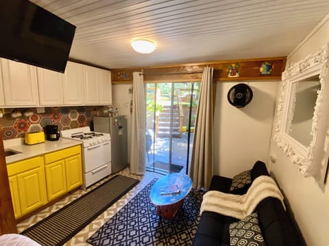 kitchen sitting area, exclusive patio area just steps from swimming pool.