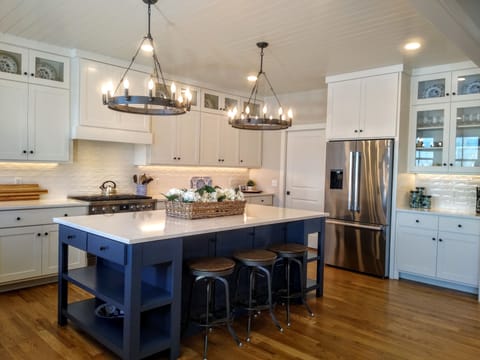 Custom kitchen with coffee serving area