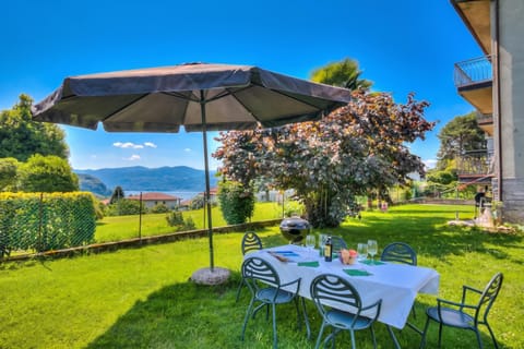 Standard Apartment, 4 Bedrooms, 2 Bathrooms (Residenza Il Parco Family Retreat) | Outdoor dining