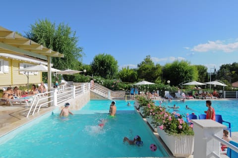 2 outdoor pools, open 9:30 AM to 7 PM, pool umbrellas, sun loungers