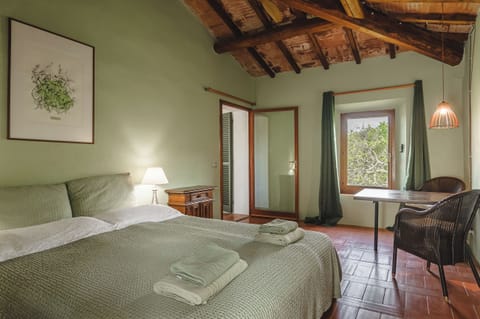 En-suite bedroom with garden views