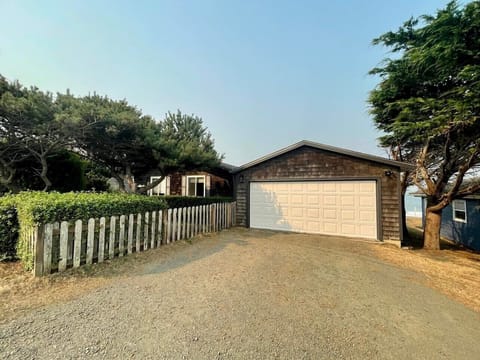 2-car garage with a driveway that can fit 20-ft trailer.