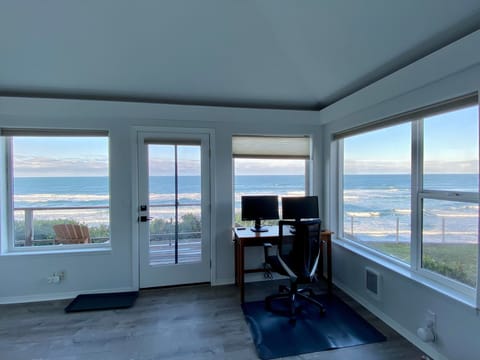 Office with 2 monitors and USB-C docking adaptor.