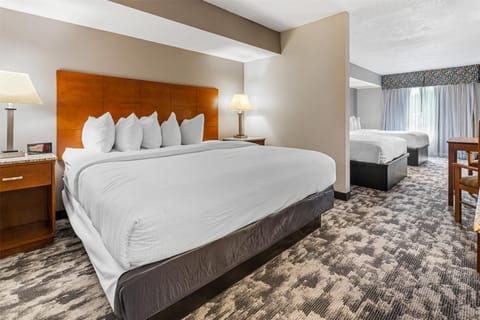 Standard Room, Multiple Beds, Non Smoking, Refrigerator & Microwave (1 king and 2 queen beds) | Blackout drapes, iron/ironing board, Internet, bed sheets