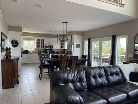 Kitchen, dining area, deck, pictures from great room on main floor