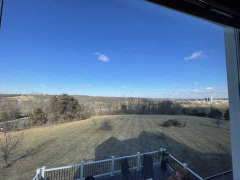 View from 2nd floor bedroom with couch before pool was installed