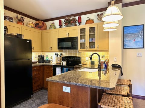 The fully equipped kitchen includes Keurig and drip coffee maker and supplies.