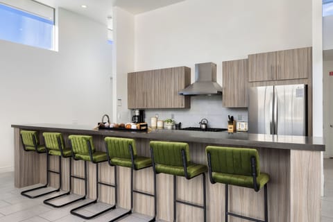 Large kitchen island with barstool seating.