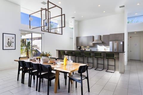 Stunning interior design, a chic dining area, and a chef's kitchen.