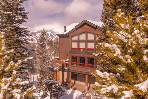 House exterior with ski area in the background