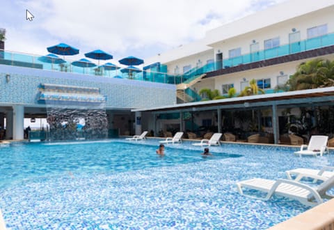 2 outdoor pools, open 7:00 AM to 9:30 PM, pool umbrellas