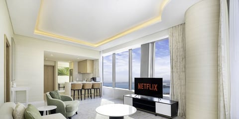 Deluxe Apartment | Living room | 55-inch Smart TV with cable channels, TV
