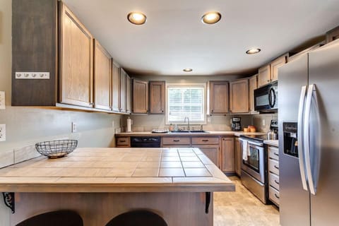 Enjoy a hot cup of coffee at the counter in the morning.