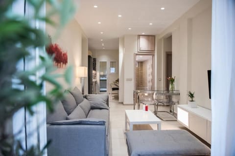 Luxury Apartment, 2 Bedrooms | Living room | 36-inch flat-screen TV with satellite channels, TV