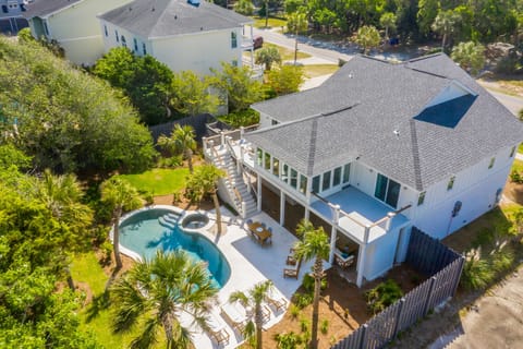 Your private Isle of Palms resort — White Sands features a sparkling pool, lush landscaping, and plenty of space for the whole family