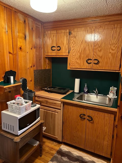 Room 6 at Bellamy's Haus | Private kitchenette | Microwave, coffee/tea maker, freezer, paper towels