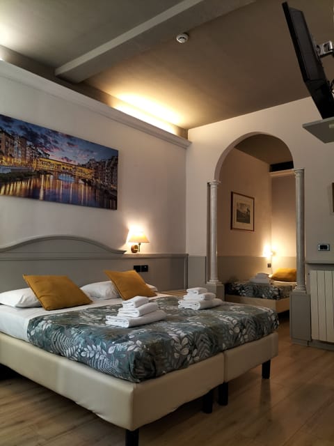 Quadruple Room | Minibar, in-room safe, desk, soundproofing