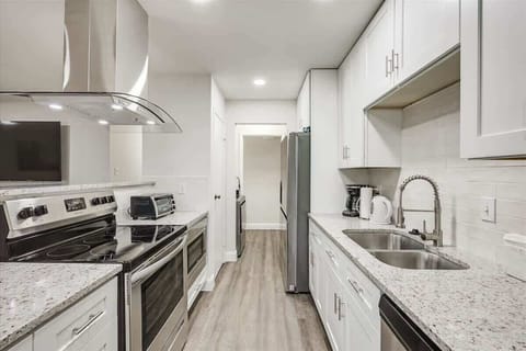 Brand new kitchen with stainless steel appliances